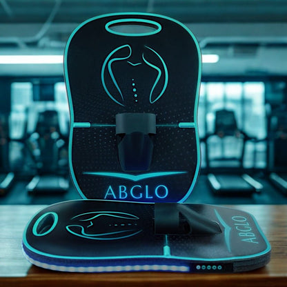 ABGLO fitness device on a table with gym equipment in the background